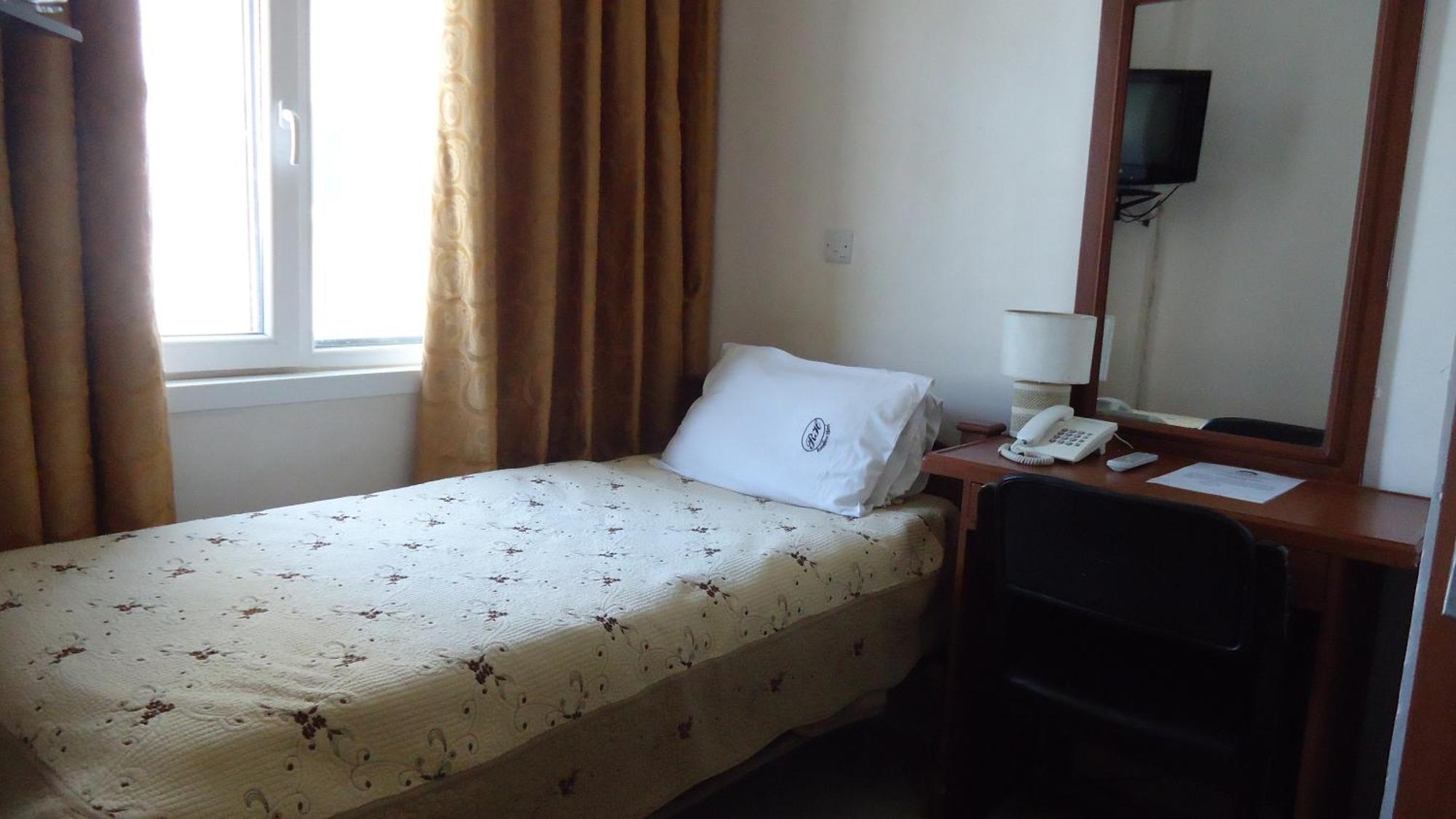 Rainbow Hotel Dar es Salaam Pokoj fotografie
